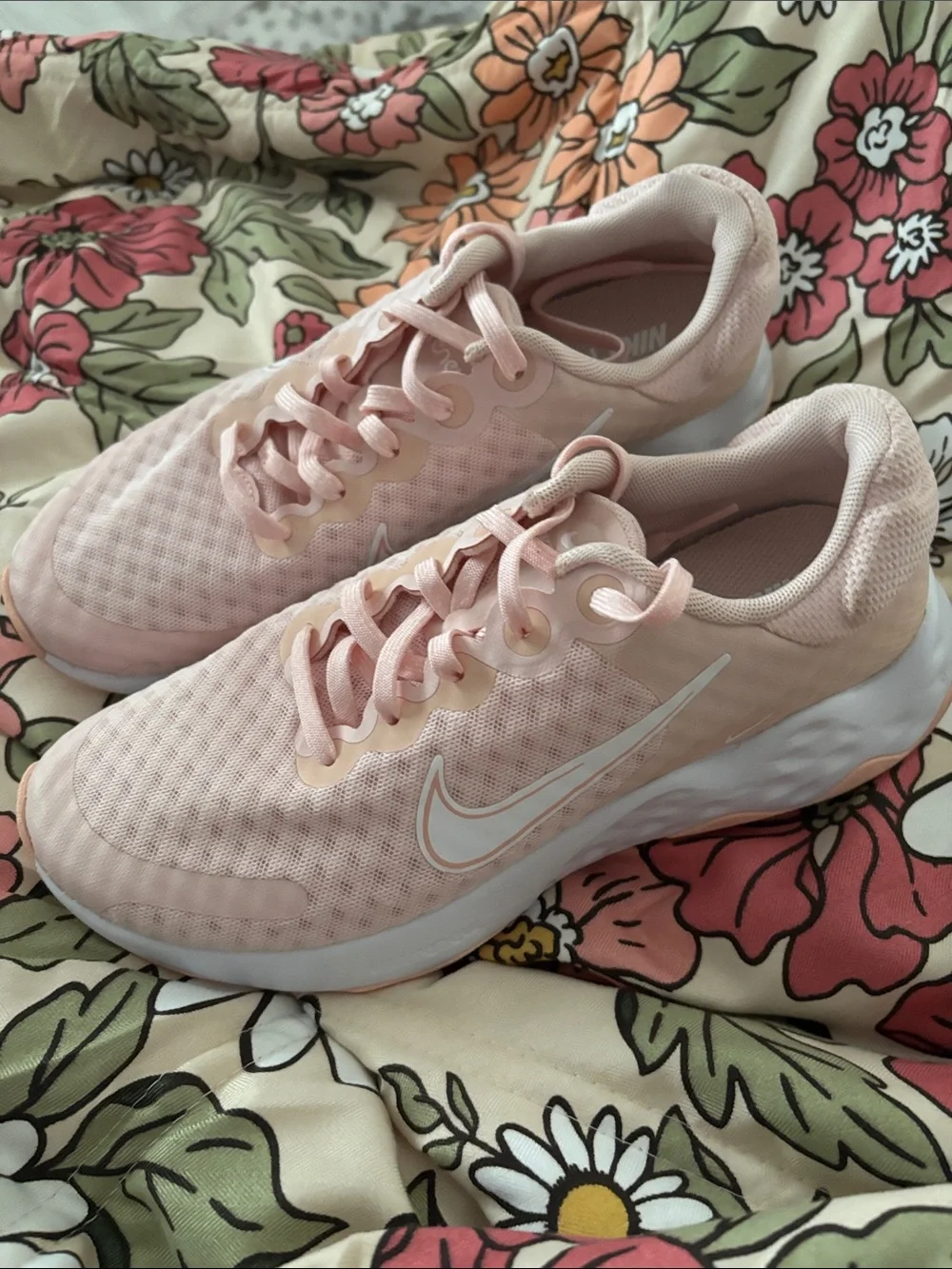 Nike Women’s Light Pink Mesh Running Sneakers with White Swoosh